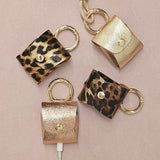 Bijou de sac, porte écouteur cuir